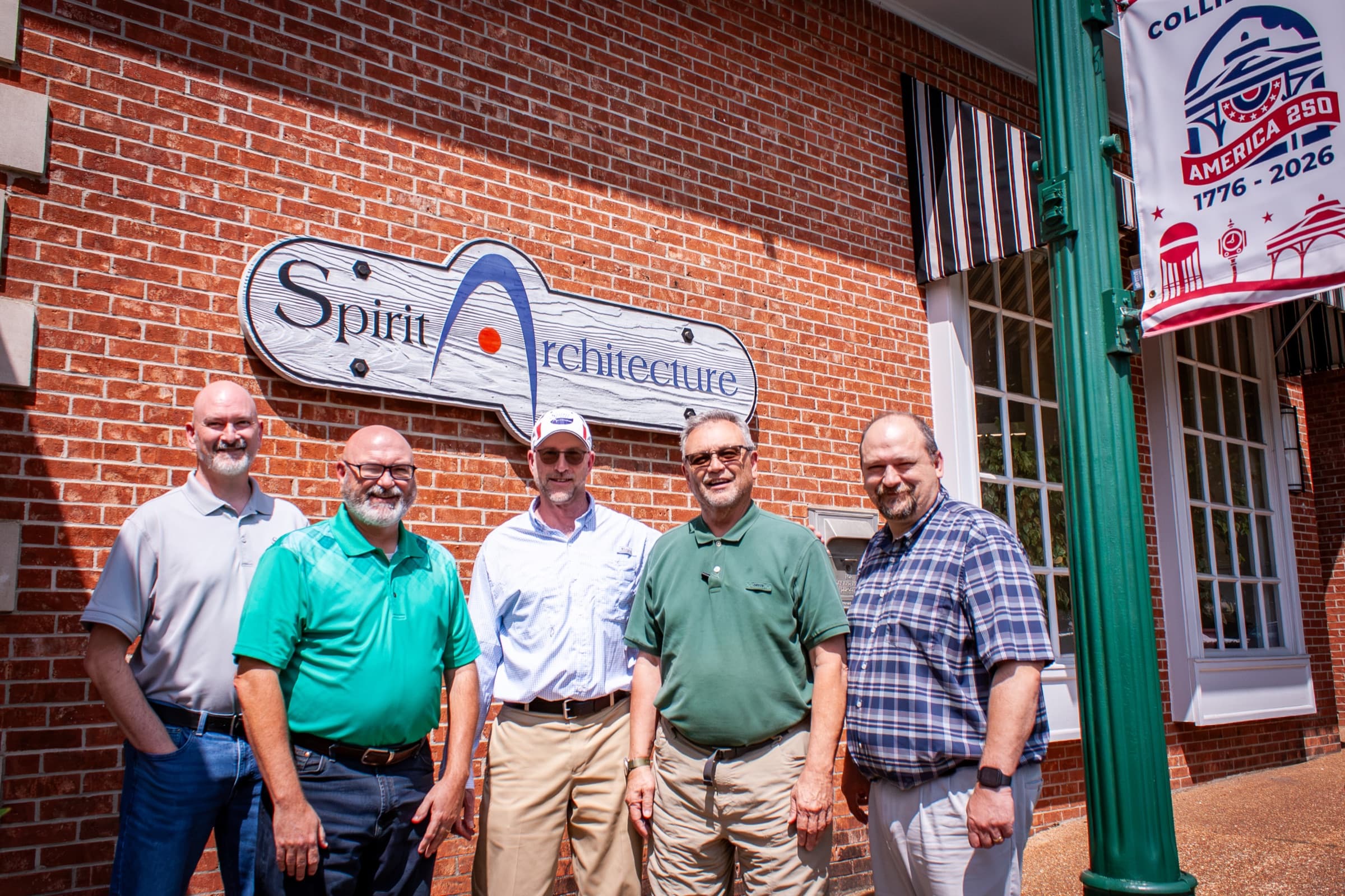SpiritArchitecture Group team outside the historic Collierville Town Square office in 2026